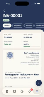 A paid Kelpie invoice on a phone — totals, tax-invoice details and recorded payments