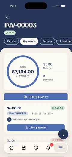 A paid Kelpie invoice on a phone — payments logged against the balance, ready to sync to Xero
